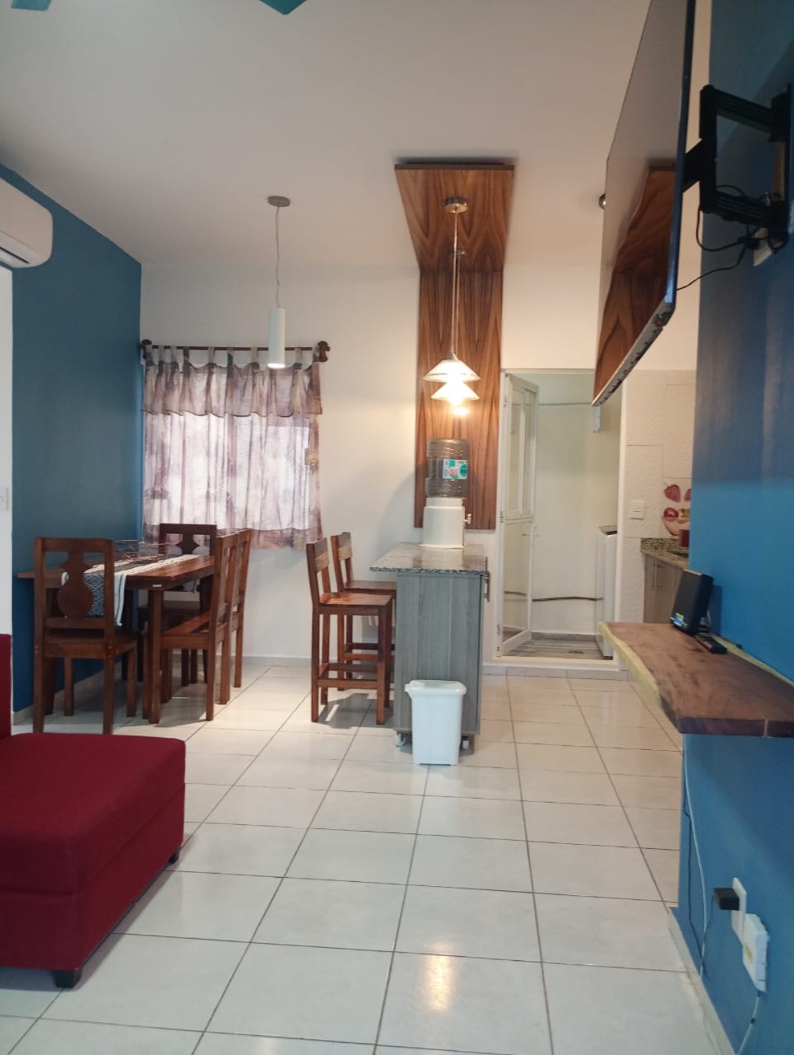 Sala, comedor y cocina del departamento